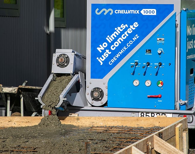 Crewmix CM1000 volumetric concrete plant pouring concrete directly into prepped and boxed pad
