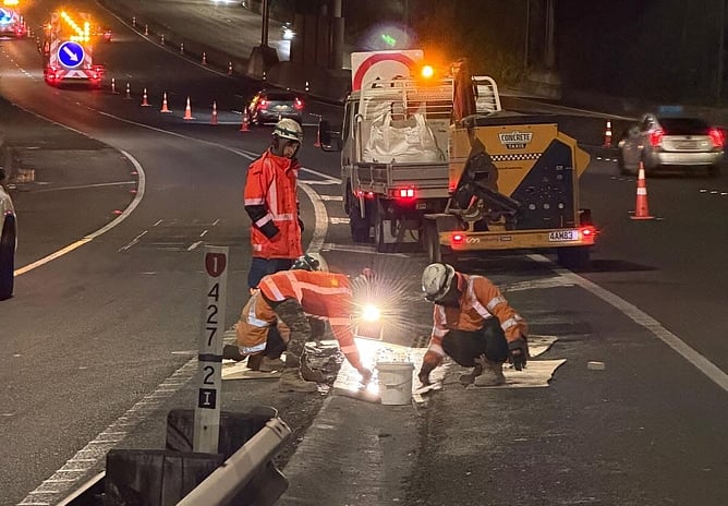 Volumetric concrete plant pours concrete for roadworks on motorway