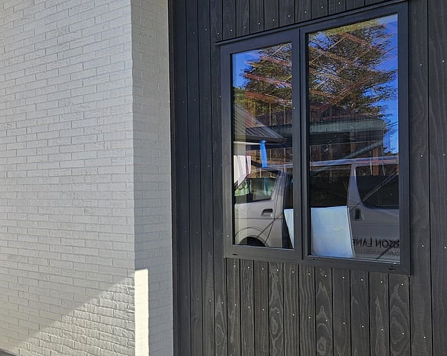 Brick cladding with Accoya timber accents