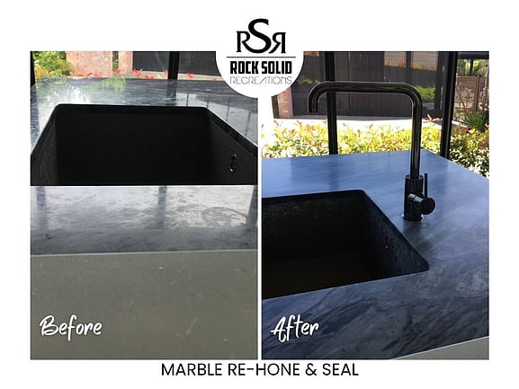 Before and after dark marble re-hone and seal showing a deeper, cleaner stone finish.