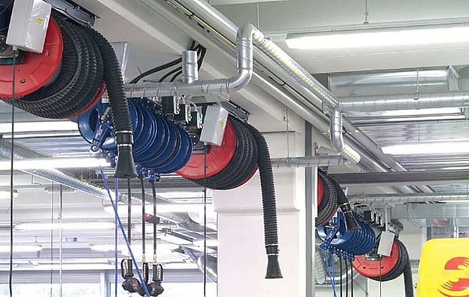 Retractable workshop exhaust extraction system for vehicle fumes