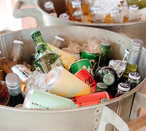 Bucket of chilled beverages provided for guests at the Ebode open home event