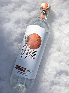Straight Up Carrot Gin in the snow