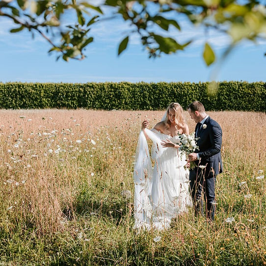 Couple in the Hay Field
