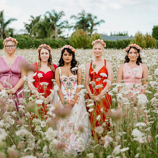 Bride and Bridesmaids in the Hay Field