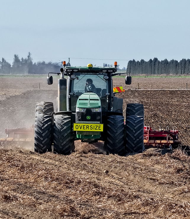 A Pye Group tractor cultivating a paddock in Canterbury