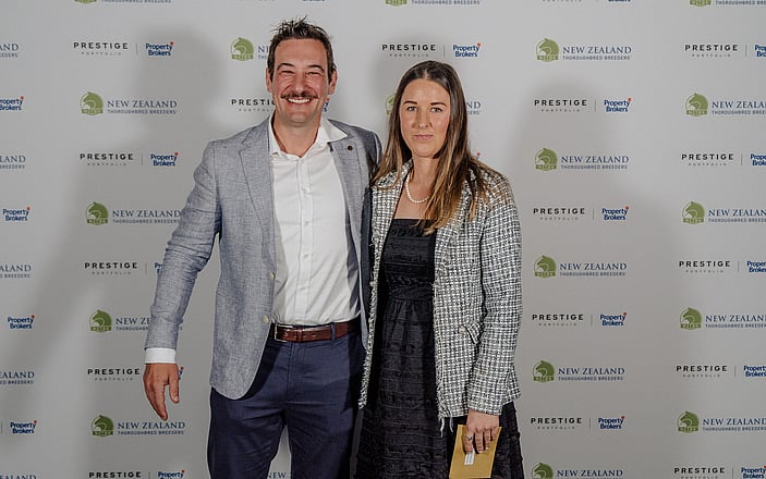 2026 winner Jess Greenfield pictured with NZTR representative Zac Reynolds on behalf of sponsor LOVERACING.NZ
