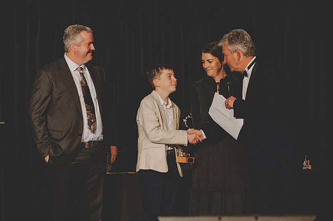Fraser Auret alongside his son Milton and wife Erin at last year's National Breeding Awards -  Photo: Cornege Media