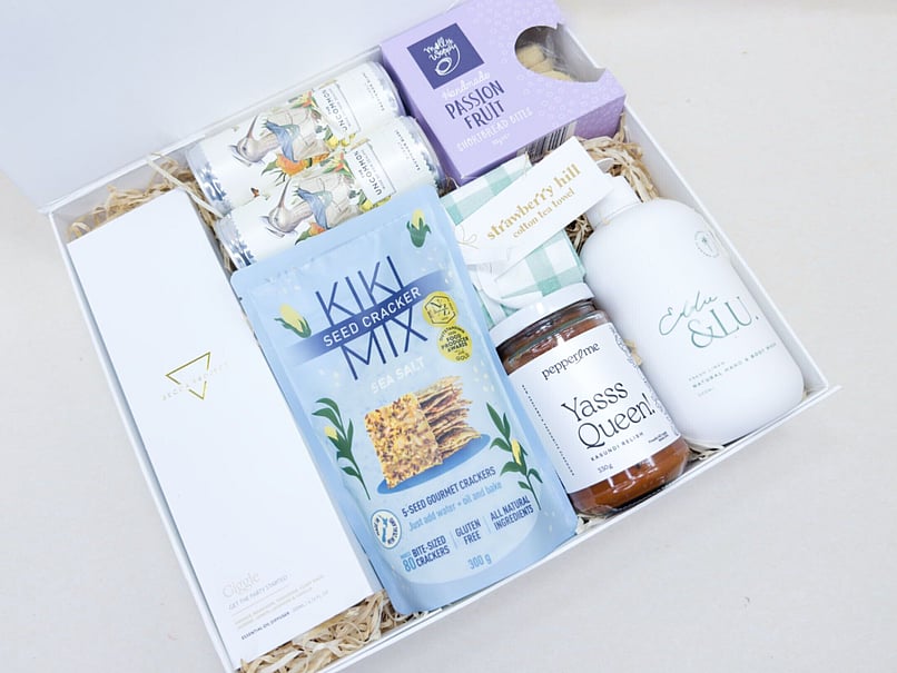 Home Treat gift box with gourmet snacks, sweet treats and relaxing comforts for any occasion.
