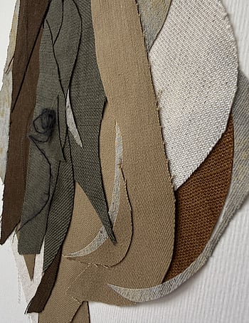 detail image of neutral earth-toned linen and cotton fragments, showing weave texture and soft frayed edges