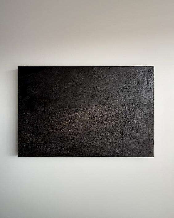 full image of moody landscape painting on linen, with a heavily textured deep cocoa-toned surface of mineral texture, creating fractured ridges and recessed pockets with soft caramel tones blended along the central ridge
