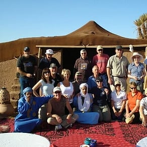World On Wheels tour group posing together in Morocco