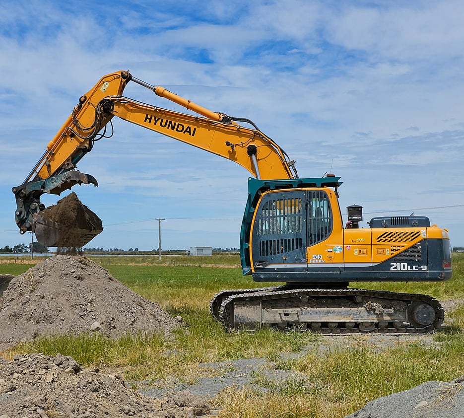 A Pye Group excavator doing earthworks on a Canterbury farm