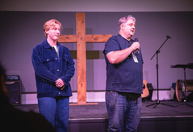 Stephaan (left) and Steve (right) share their story at Auckland Summit Connect.