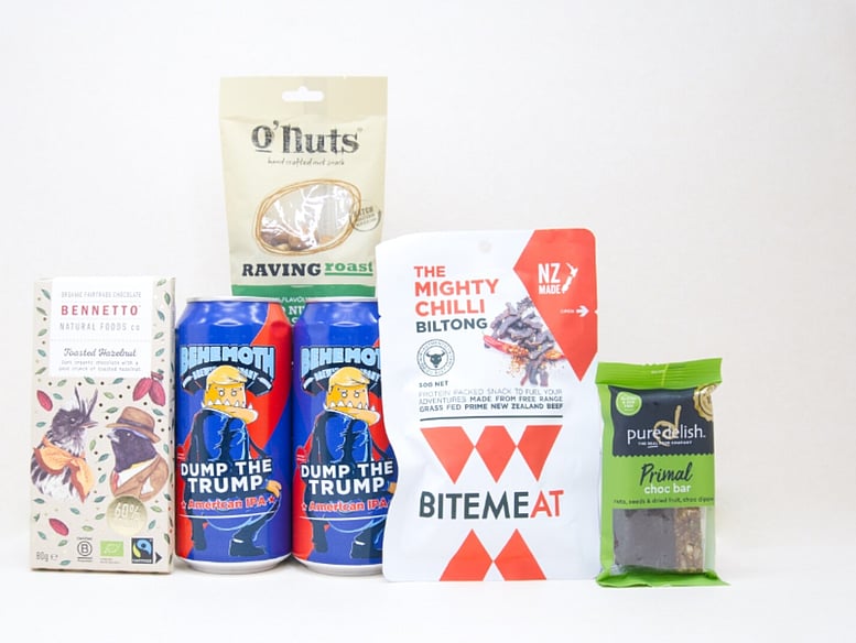 Beer & Bites Gift Box NZ featuring Behemoth Dump The Trump IPA, gourmet jerky, roasted nuts, artisan chocolate and premium snacks.