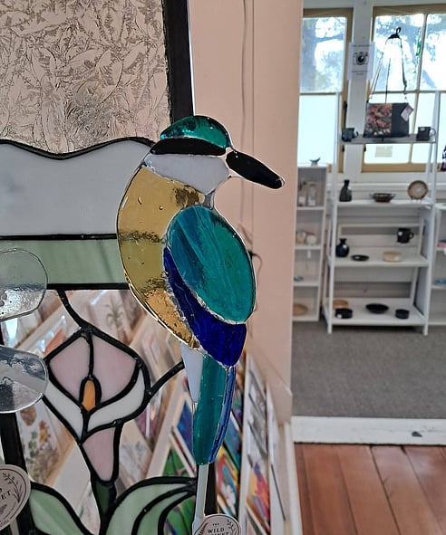 Handcrafted glass bird art by The Wild Cabinet
