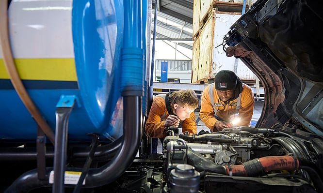 Diesel mechanics checking diagnostics on a fleet truck. Dudley Mechanical & Parts. Taupo.