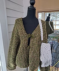 Handmade crochet garment by Damn She's Fine Art