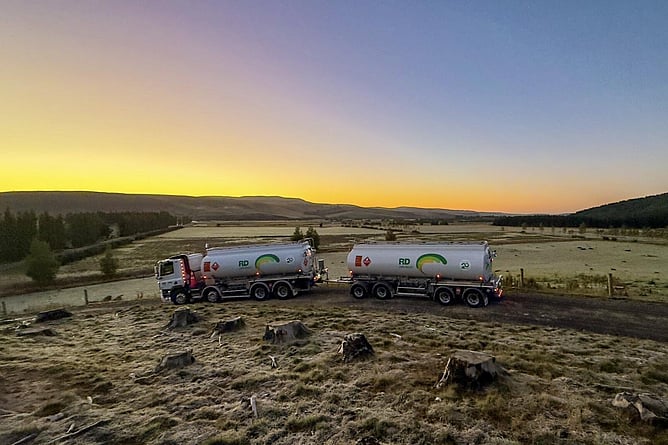 RD Petroleum B-train fuel tanker parked overlooking rural Southland at sunrise