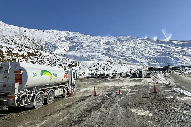 RD Petroleum fuel tanker parked on the access road at Treble Cone Ski Field near Wānaka, snowmaking in the background
