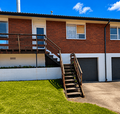 Before exterior repaint of brick home in Rotorua prepared for resale