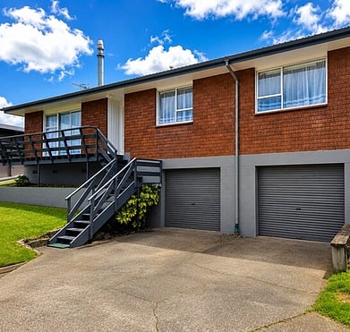 Freshly repainted brick house exterior in Rotorua ready for resale