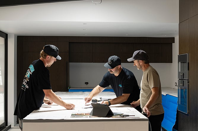 Builder working with professionals during the planning of a new home