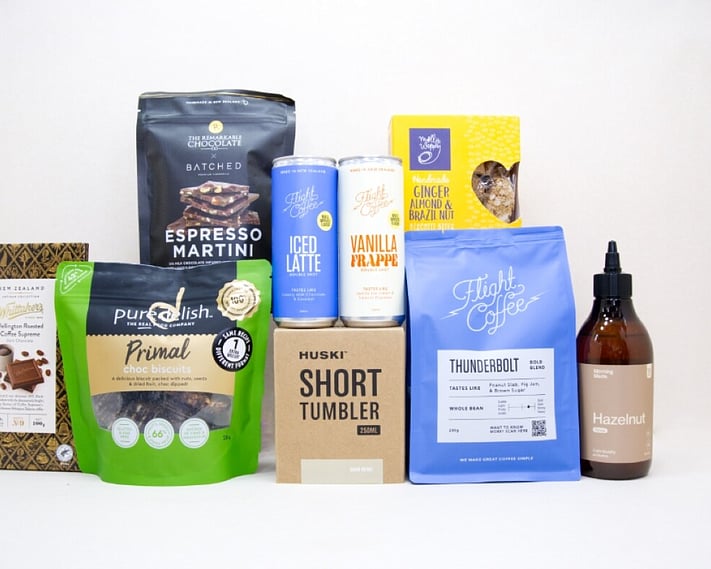 Coffee Gift Box featuring Flight Coffee, HUSKI tumbler, hazelnut syrup, coffee chocolate, and NZ-made treats.