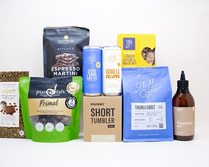 Coffee Gift Box featuring Flight Coffee, HUSKI tumbler, hazelnut syrup, coffee chocolate, and NZ-made treats.