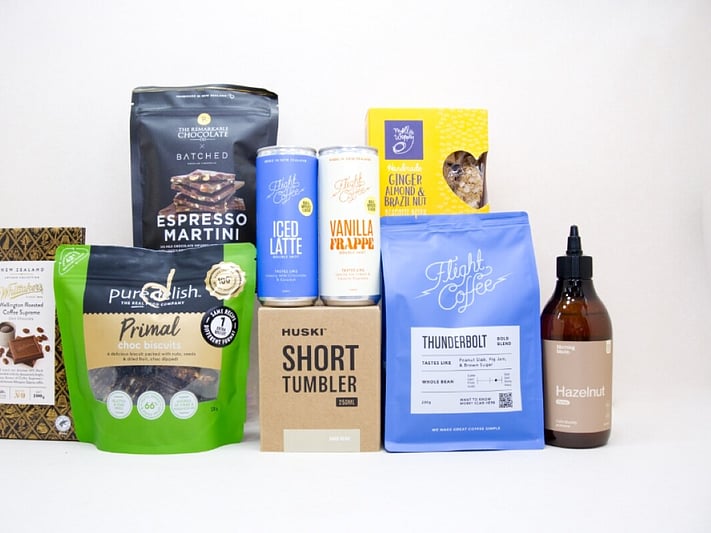 Coffee Gift Box featuring Flight Coffee beans, HUSKI coffee cup, Morning Made hazelnut syrup, coffee chocolates, biscotti, and gourmet NZ-made treats.