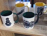 Māori-inspired fine artwork mugs by Amylena Dansey