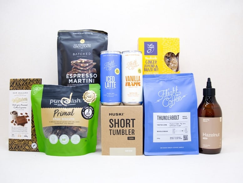 Coffee Gift Box featuring Flight Coffee beans, HUSKI coffee cup, Morning Made hazelnut syrup, coffee chocolates, biscotti, and gourmet NZ-made treats.