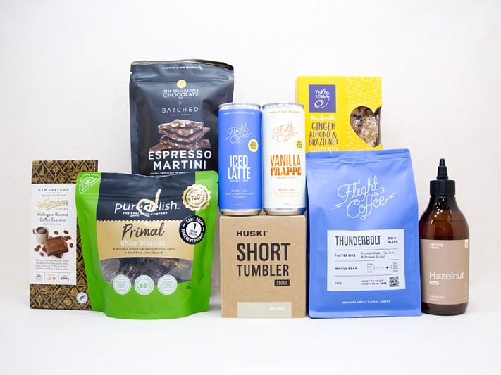 Coffee Gift Box featuring Flight Coffee beans, HUSKI coffee cup, Morning Made hazelnut syrup, coffee chocolates, biscotti, and gourmet NZ-made treats.