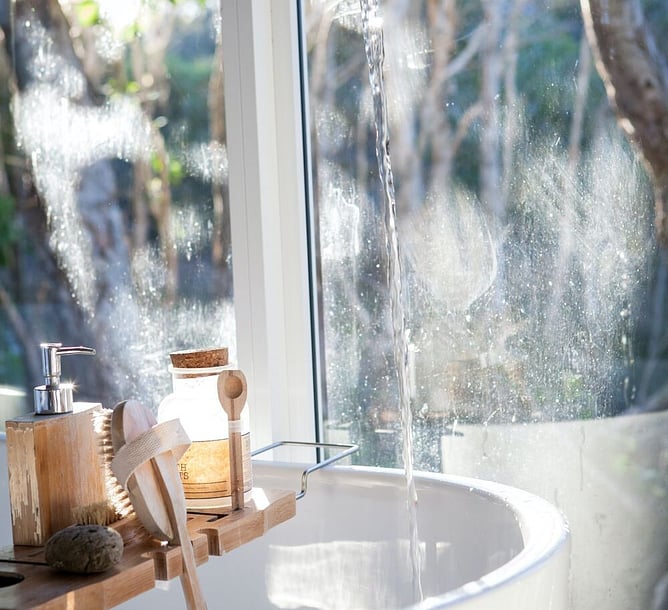 hot water flowing into bath