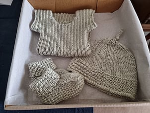 Handknit baby clothing by Kiwi Baby Knits