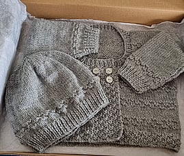 Handknit baby clothing by Kiwi Baby Knits