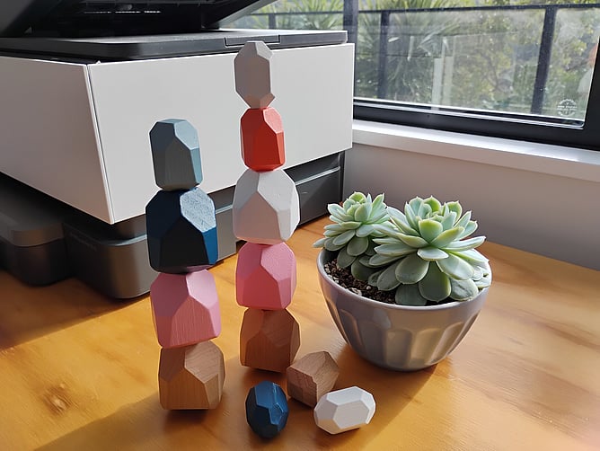 Coloured 'mindfulness stacking stones' as a metaphor for rebuilding your job through job crafting