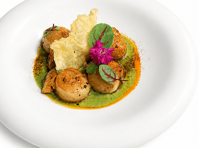 Pan-seared scallops at Game Keepers Restaurant in Waimauku