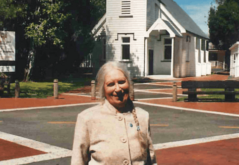 Eastern Bay Community Foundation donor Verna McDonnell stands in front of the Ōpōtiki Church.
