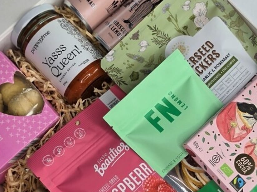 Close-up of the Gin O'Clock gift box featuring artisan gin, premium treats and New Zealand made products.