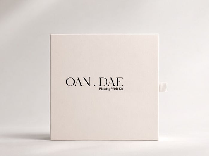 Close-up of Oan Dae Wish Kits bath and wellness products featured in a KYND gift box.