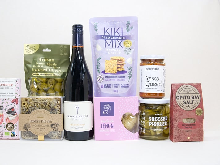 Corporate gift hamper NZ with Craggy Range red wine, honeycomb, artisan crackers, gourmet condiments, and premium chocolate beautifully packaged for gifting.