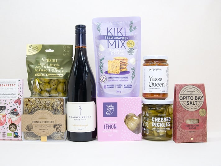 Corporate gift hamper NZ with Craggy Range red wine, honeycomb, artisan crackers, gourmet condiments, and premium chocolate beautifully packaged for gifting.