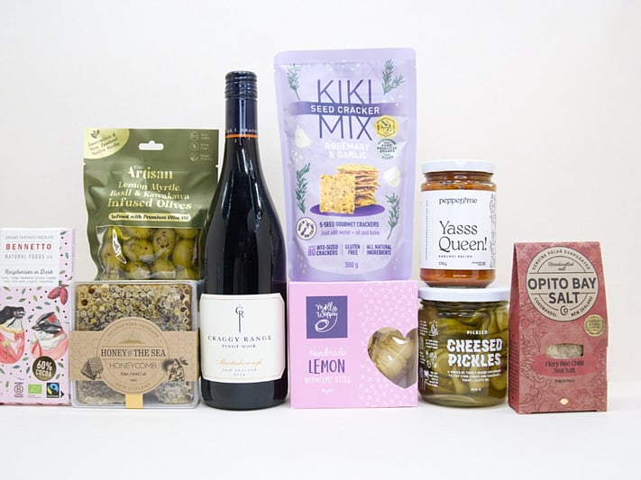 Corporate gift hamper NZ with Craggy Range red wine, honeycomb, artisan crackers, gourmet condiments, and premium chocolate beautifully packaged for gifting.