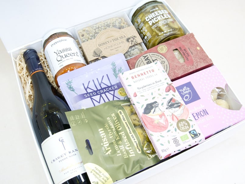 Corporate gift hamper NZ with Craggy Range red wine, honeycomb, artisan crackers, gourmet condiments, and premium chocolate beautifully packaged for gifting.