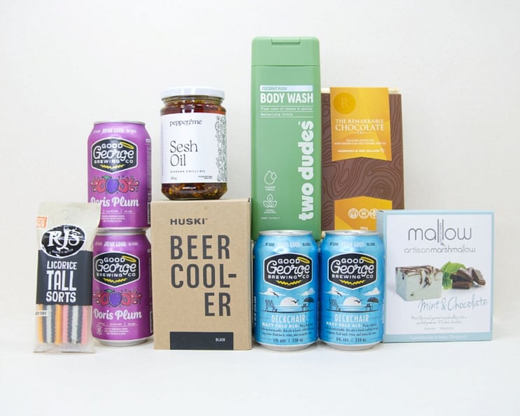 spoil him gift box with huski cooler, mallow marshmallow, remarkable chocolate, good george cider and ipa and two dudes body wash