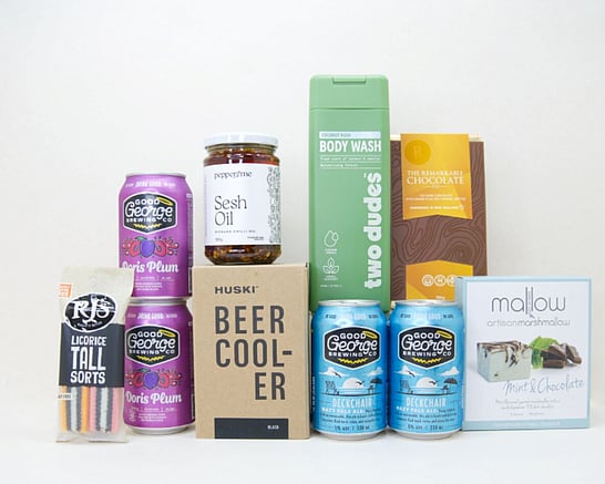 spoil him gift box with huski cooler, mallow marshmallow, remarkable chocolate, good george cider and ipa and two dudes body wash