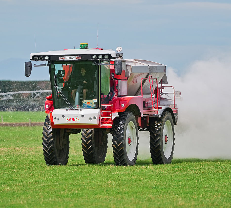 A Pye Group fertiliser spreader applying fertiliser across a Canterbury paddock