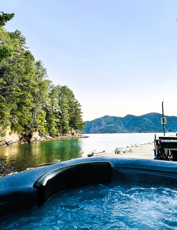 Water front hot tub at Tawa Cove Cabins, Endeavour Inlet
