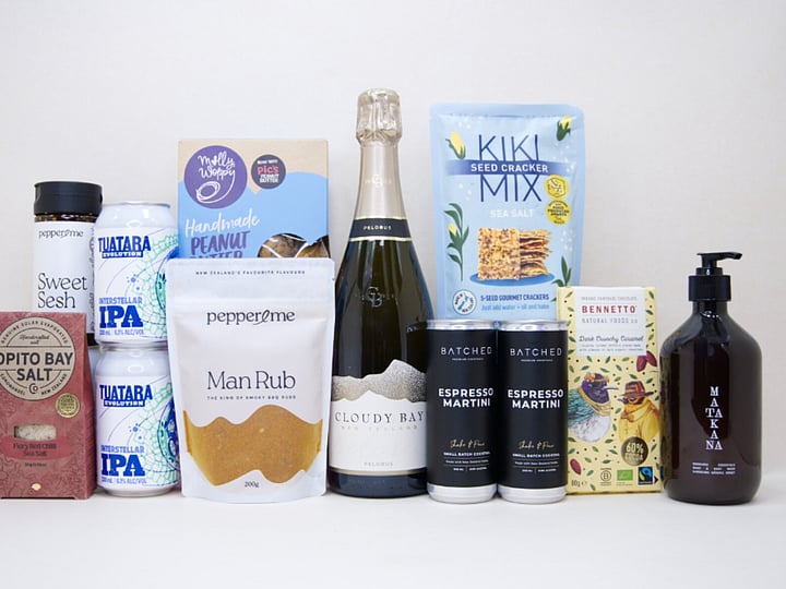 Welcome Home Gift Box with Cloudy Bay wine, espresso martinis, gourmet crackers, honey, artisan chocolate, hand wash, and New Zealand-made pantry favourites, beautifully packaged for housewarming and new home gifting.